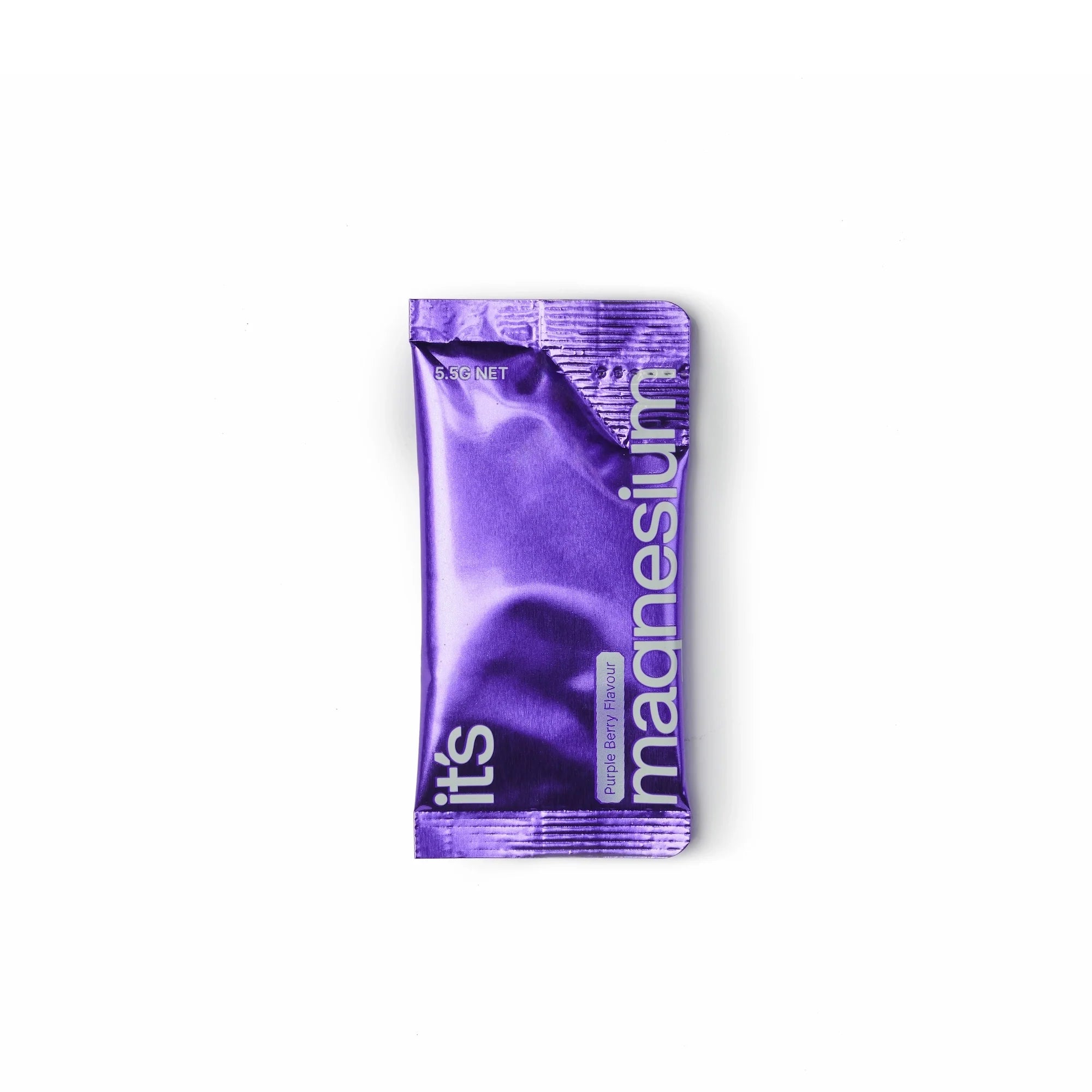 Purple packet of magnesium supplement on a white background