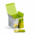 Box of magnesium supplement packets with a green and white design on a white background