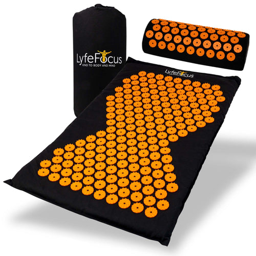 Acupressure mat and pillow set with orange nodes on a white background, branded 'LyfeFocus'.