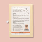 Back of a Kloris Co product packaging with text and QR code on a pink background