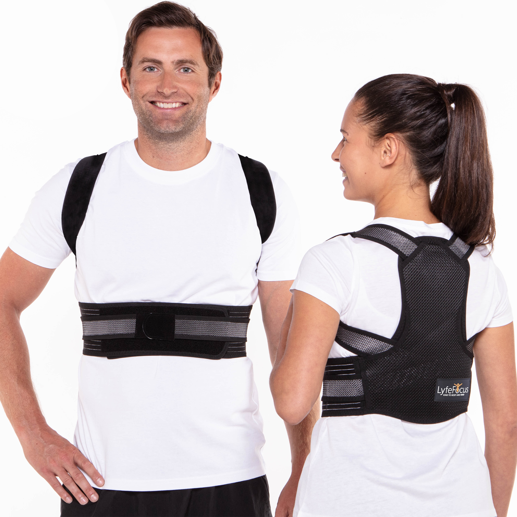 Two people wearing black posture correctors on a white background