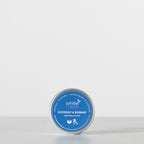 Tin of White Rabbit Coconut & Rosehip Calming Cream on a white background