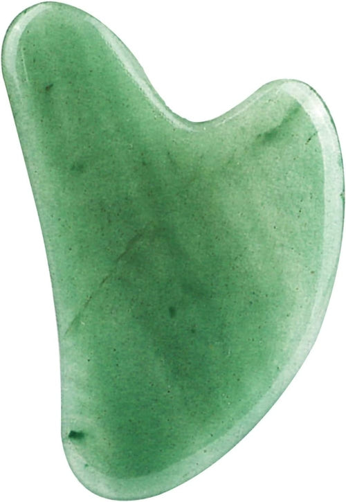 Green jade gua sha tool on a white background