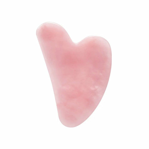 Pink heart-shaped object on a white background