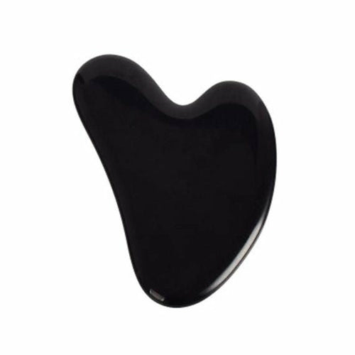 Black Gua Sha tool on a white background