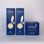 Three blue boxes of White Rabbit skincare products on a white background